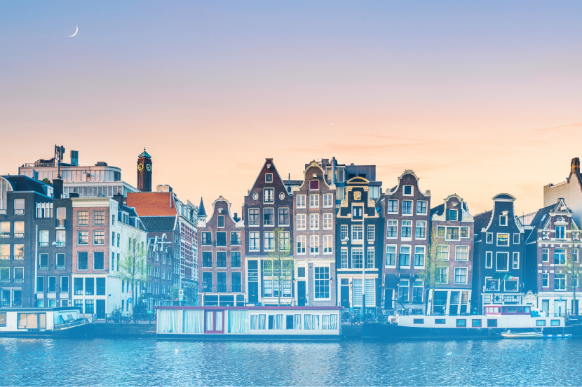Photo of buildings at sunrise in Amsterdam