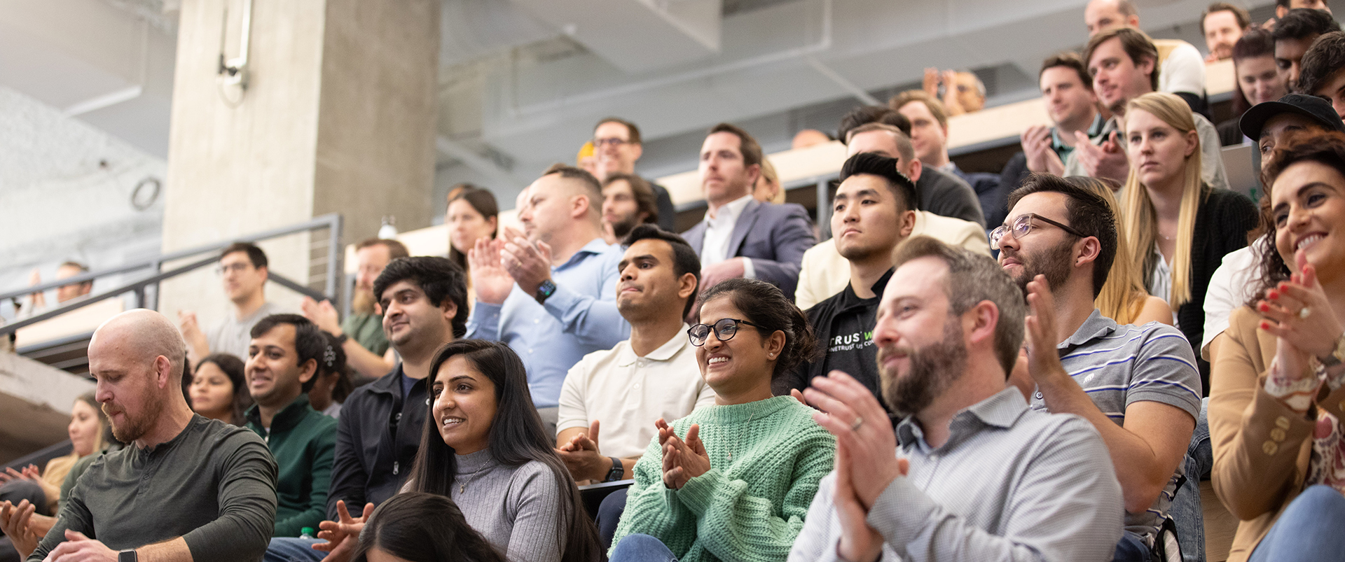 Employees gathered in the Atlanta office auditorium for a company-wide meeting