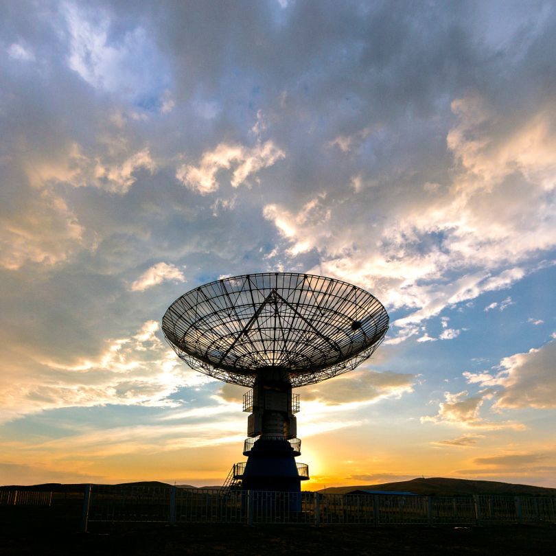 Satellite dish in a sunset