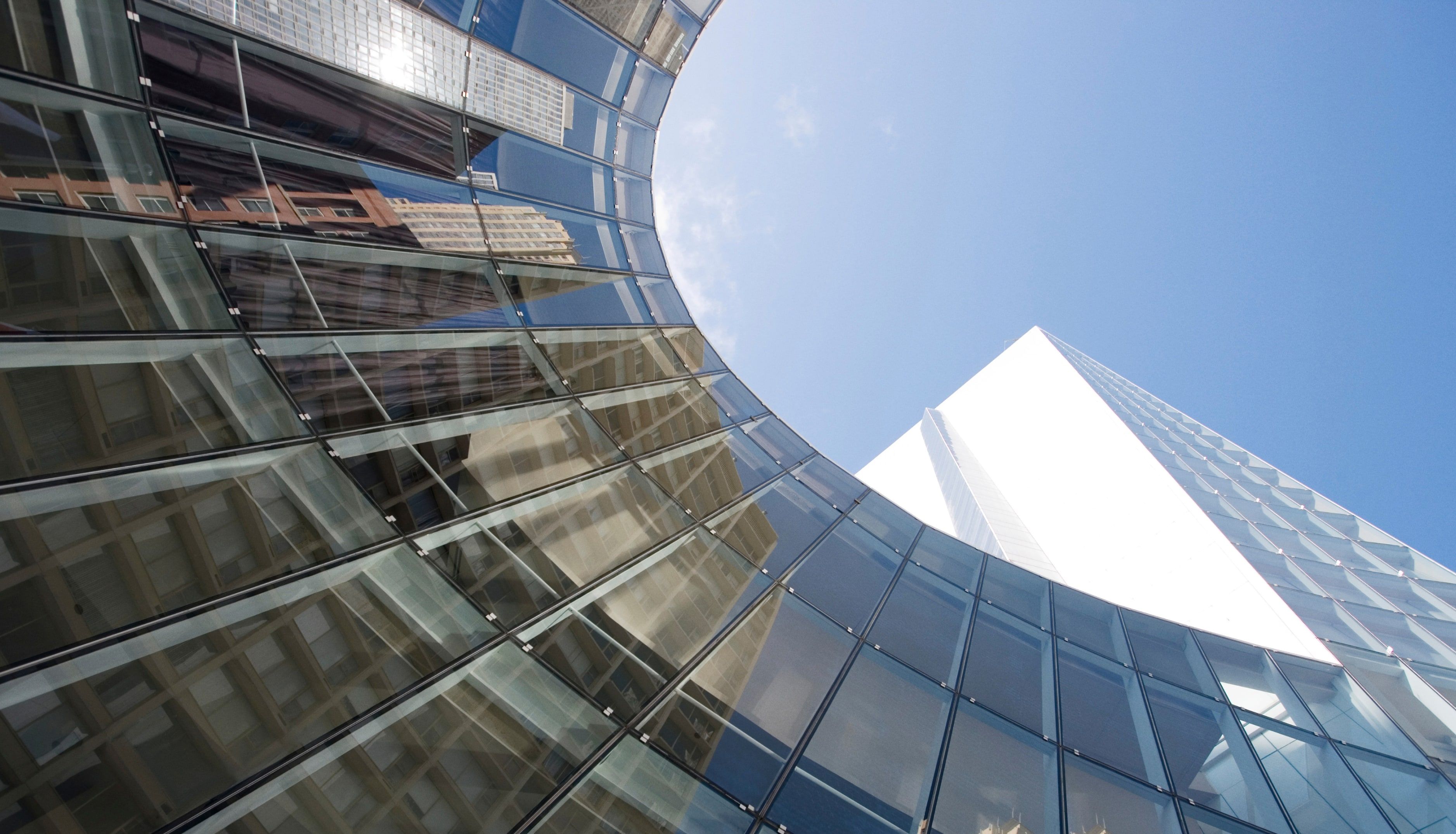 Looking up at the exterior of an office building